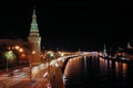 Kremlin tower and river at night