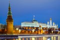 Kremlin wall and towers with stars. Moscow river is covered with layer of snow Royalty Free Stock Photo