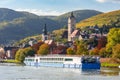 Krems cityscape and cruise boat on Danube river in autumn, Wachau valley, Austria