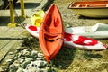 Kreta or Crete  Greece : Bunch of colorful kayaks kept on ground under the sun for tourist next to beach. Royalty Free Stock Photo