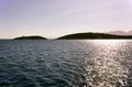 Kreta, Greece: Simple Seascape view showing turquoise calm water of the Mediterranean sea against Mountain in the far background