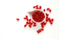 Krill oil gelatin capsules in white cup on a white background.omega fatty acids.Healthy eating and food supplements