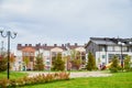 Kriov, Russi - September 08, 2019: Street in a small town, green lawn and houses in a summer Royalty Free Stock Photo