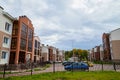 Kriov, Russi - September 08, 2019: Street in a small town, green lawn and houses in a summer Royalty Free Stock Photo