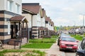 Kriov, Russi - September 08, 2019: Street in a small town, green lawn and houses in a summer Royalty Free Stock Photo