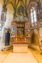 Krivoklat, Czech Republic - 12.6.2020: Interior of the chapel at Krivoklat castle. Gothic altar. Tourist are visiting the