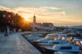 Krk, the largest town on the Krk island, Kvarner bay, Croatia. Scenic view of the harbor, embankment and Krk cathedral at sunrise Royalty Free Stock Photo