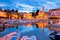 Krk. Town of Malinska waterfront and harbor dawn view Royalty Free Stock Photo