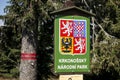The crest of Czech Republic with the name of National Park of Giant Mountains Krkonose, KRNAP in nature reservation