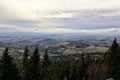 Krkonose panorama with spruces and cloudy sky before winter Royalty Free Stock Photo