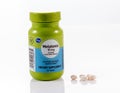 Kroger melatonin capusules and bottle isolated against white background Royalty Free Stock Photo