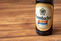 Krombacher wheat beer on table. logo of the brand Krombacher Weizen
