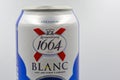 Kronenbourg Blanc 1664 wheat beer with citrus can closeup on white