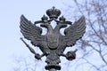 The old skullpture of the two-headed eagle is the coat of arms of the Russian Empire Royalty Free Stock Photo