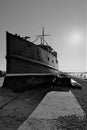 Kronstadt, Russia, October 2018. Old boat on the pier as a museum piece.