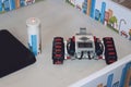 KROPIVNITSKIY, UKRAINE Ã¢â¬â 12 MAY, 2018: Lego robot Mindstorms EV3 with laptop. Programmable four wheels drive 4WD robotic car