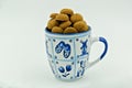 Kruidnoten in a Delft Blue Mug Royalty Free Stock Photo