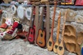 KRUJE, ALBANIA - June 2018: Traditional Ottoman market in Kruja. Flea market in Albania. Antique dutar - the national Royalty Free Stock Photo