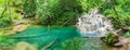 Krushuna waterfalls, Bulgaria - forest and blue water landscape - panorama Royalty Free Stock Photo