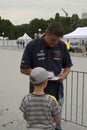 Krzysztof Cholowczyc Polish rally driver and MEP signing autographs on Verva Street Racing in Warsaw, Poland