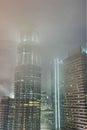 Petronas tower on a rainy night in Kuala Lumpur