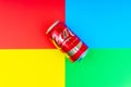 Coca - Cola carbonated soft drink on colorful background