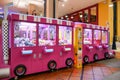 Kuala Lumpur,Malaysia - April 13,2019 : Colorful arcade game toy claw crane machine where people can win toys and other prizes Royalty Free Stock Photo