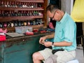 Man and the watch repair