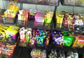 Packed miscellaneous junk foods & snacks on rack for sale