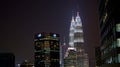 KUALA LUMPUR, MALAYSIA - APRIL 13: Petronas Twin Towers and city at night scene. Royalty Free Stock Photo