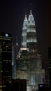 KUALA LUMPUR, MALAYSIA - APRIL 13: Petronas Twin Towers and city at night scene. Royalty Free Stock Photo