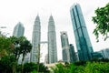 Kuala Lumpur, Malaysia - April, 2019 Petronas Twin towers panorama, Kuala Lumpur central park