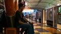 Unidentified boys waiting for the LRT train to stop at the Imbi station