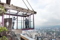 Visitors taking photo at the KL Tower Skybox, on Skydeck. KL Tower is popular tourist