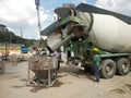 Concreting work by construction workers at the construction site.