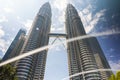 Kuala Lumpur, Malaysia - August 13, 2022: The KLCC Park with the water fountain show in front of the Petronas towers. Long