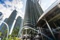 Kuala Lumpur, Malaysia - August 13, 2022: The KLCC Park with the water fountain show in front of the Petronas towers. Long