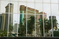 Reflection of the office buildings in the modern building windows in Kuala Lumpur, Malaysia. Royalty Free Stock Photo