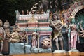 KUALA LUMPUR, MALAYSIA - AUGUST 23, 2013: Statues of Hindu deities in the temple of Batu Caves, a complex of limestone Royalty Free Stock Photo