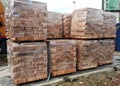 Stock pile of clay brick on wooden pallets stacked at the construction site. Royalty Free Stock Photo