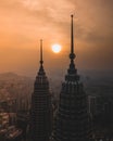 Petronas Twin Tower during sunrise Royalty Free Stock Photo