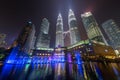 Kuala Lumpur, Malaysia - circa September 2015: Panorama of Petronas Twin Towers and Lake Symphony by night