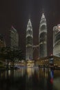 KUALA LUMPUR, MALAYSIA - December 12, 2017: The Petronas Twin Towers in Kuala Lumpur at night lighted up for the Christmas. Royalty Free Stock Photo