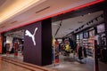 KUALA LUMPUR, MALAYSIA - DECEMBER 04, 2022: Puma brand retail shop logo signboard on the storefront in the shopping mall