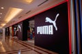 KUALA LUMPUR, MALAYSIA - DECEMBER 04, 2022: Puma brand retail shop logo signboard on the storefront in the shopping mall