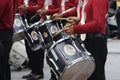 Brass band players playing a musical instrument while Royalty Free Stock Photo