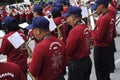 Brass band players playing a musical instrument while Royalty Free Stock Photo