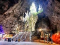 Kuala Lumpur,Malaysia - February 5, 2016:People can seen exploring and praying in the Hindu Temple in Batu Caves Royalty Free Stock Photo