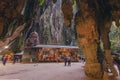 Amazing Batu caves with hindu temple and lots of pilgrims and tourists
