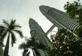 KUALA LUMPUR / MALAYSIA - JANUARY 2019 : impressive view of Petronas twin towers and bridge in Kuala Lumpur city center emerging Royalty Free Stock Photo